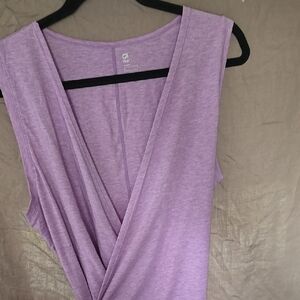 Purple Sleeveless Rap Around Top.